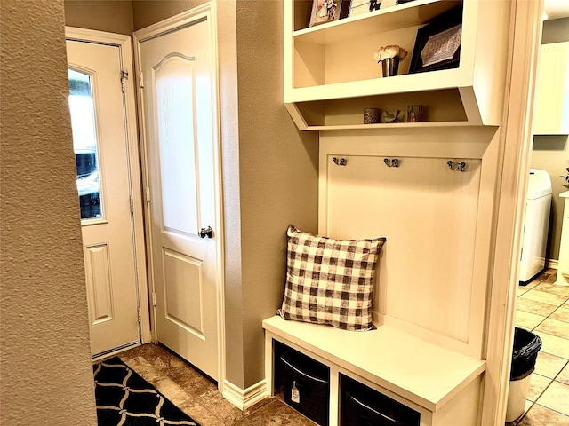 3898 County Road 135th Rd, Wharton, TX 77488 - mudroom with a textured wall and washer / dryer
