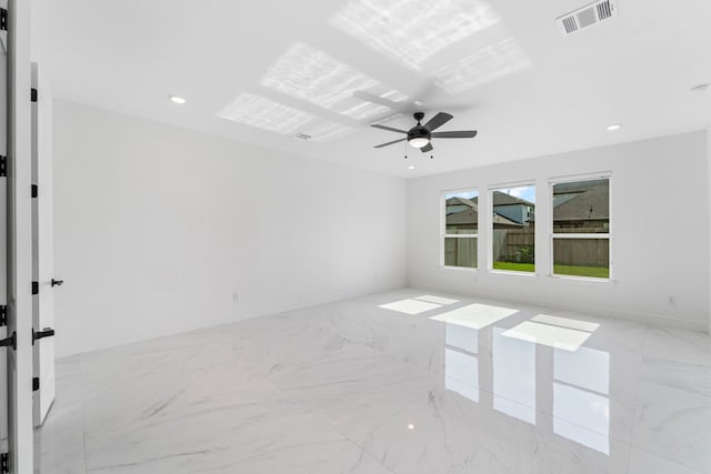 9818 Daffodil Springs Dr, Richmond, TX 77407 - empty room with marble tiled floors, a ceiling fan, baseboards, and recessed lighting