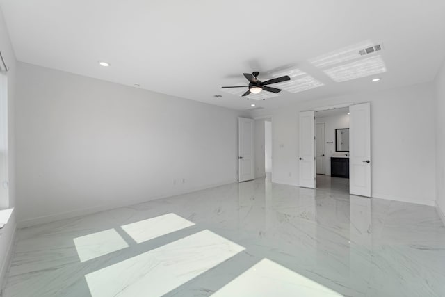 9818 Daffodil Springs Dr, Richmond, TX 77407 - spare room featuring recessed lighting, ceiling fan, baseboards, and light marble finish flooring