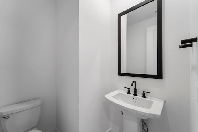 9818 Daffodil Springs Dr, Richmond, TX 77407 - half bathroom with toilet