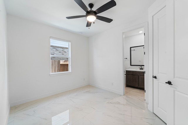 9818 Daffodil Springs Dr, Richmond, TX 77407 - unfurnished bedroom with baseboards, light marble finish flooring, ensuite bath, and ceiling fan