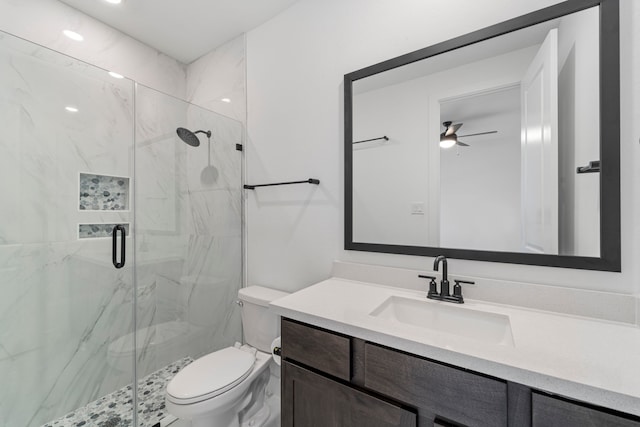9818 Daffodil Springs Dr, Richmond, TX 77407 - full bath with a marble finish shower, vanity, toilet, and ceiling fan