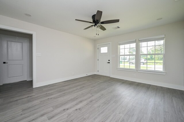 226 Hyta St, Houston, TX 77018 - entrance foyer featuring baseboards, wood finished floors, and ceiling fan