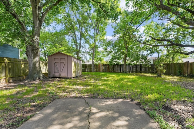 16026 Beechnut St, Houston, TX 77083 - fenced backyard featuring a patio area and a storage unit