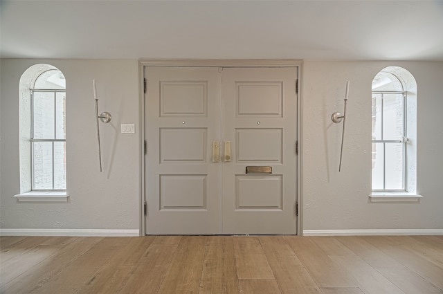 13622 Indian Creek Rd, Houston, TX 77079 - foyer entrance featuring light wood finished floors and baseboards