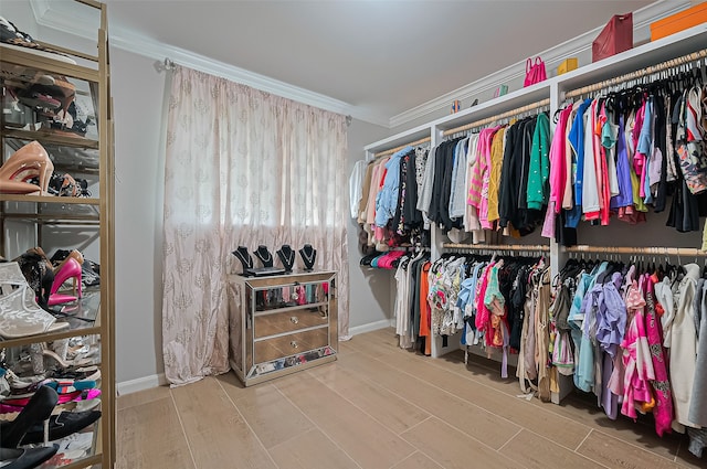 13622 Indian Creek Rd, Houston, TX 77079 - walk in closet featuring wood finished floors