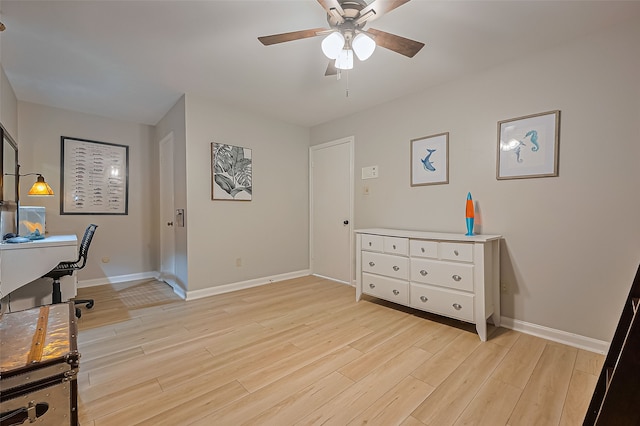 13622 Indian Creek Rd, Houston, TX 77079 - office space featuring baseboards, light wood-style floors, and ceiling fan