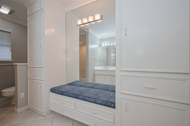 13622 Indian Creek Rd, Houston, TX 77079 - bathroom with tile patterned flooring, ornamental molding, toilet, vanity, and baseboards