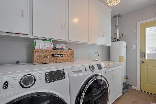 13622 Indian Creek Rd, Houston, TX 77079 - laundry room with independent washer and dryer, gas water heater, and cabinet space