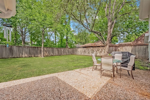 13622 Indian Creek Rd, Houston, TX 77079 - view of yard featuring a patio area and outdoor dining area