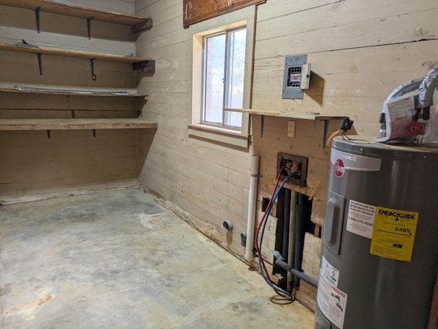 405 Gifford, Rusk, TX 75785 - below grade area with electric water heater and wood walls