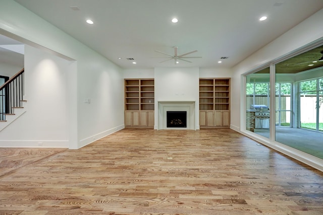 1243 Candlelight Ln, Houston, TX 77018 - unfurnished living room with ceiling fan, light wood finished floors, baseboards, recessed lighting, and a fireplace