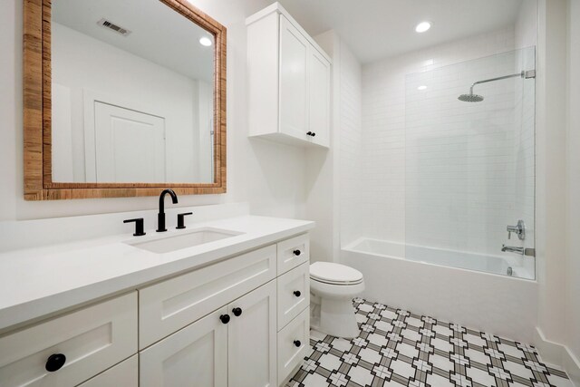 1243 Candlelight Ln, Houston, TX 77018 - bathroom featuring vanity, toilet, tub / shower combination, recessed lighting, and tile patterned floors