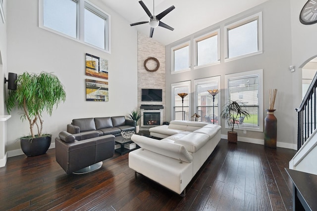 6218 Southcott Ct, Katy, TX 77450 - living room with high vaulted ceiling, ceiling fan, healthy amount of natural light, and dark wood-type flooring