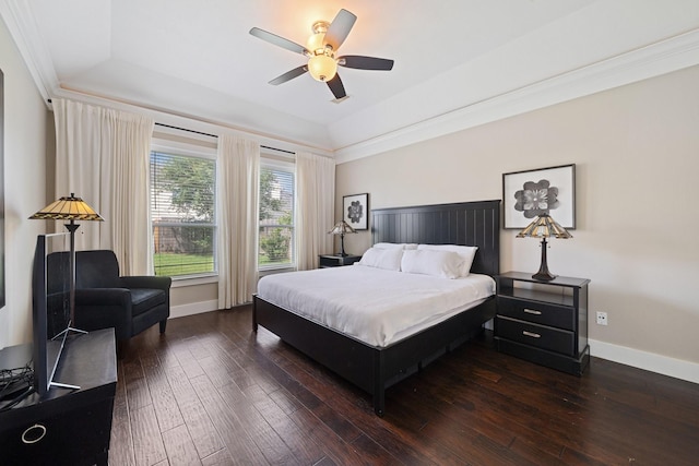 6218 Southcott Ct, Katy, TX 77450 - bedroom featuring dark wood-style flooring, baseboards, and a ceiling fan