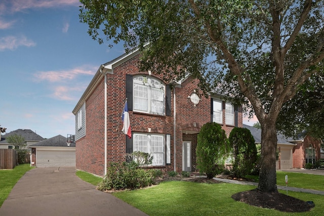 6218 Southcott Ct, Katy, TX 77450 - view of front of house featuring brick siding and a detached garage