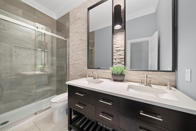 6218 Southcott Ct, Katy, TX 77450 - full bathroom featuring crown molding, double vanity, toilet, a shower stall, and tile walls