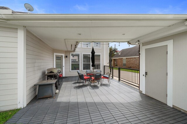 6218 Southcott Ct, Katy, TX 77450 - view of patio featuring outdoor dining area and a grill