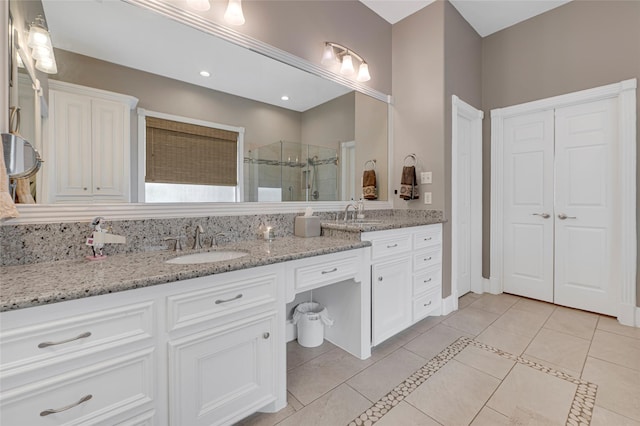 17814 Shady Arbor Way, Spring, TX 77379 - full bath with a stall shower, double vanity, tile patterned flooring, and a closet