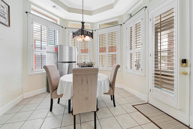 17814 Shady Arbor Way, Spring, TX 77379 - dining room featuring a chandelier, tile patterned flooring, baseboards, and a tray ceiling