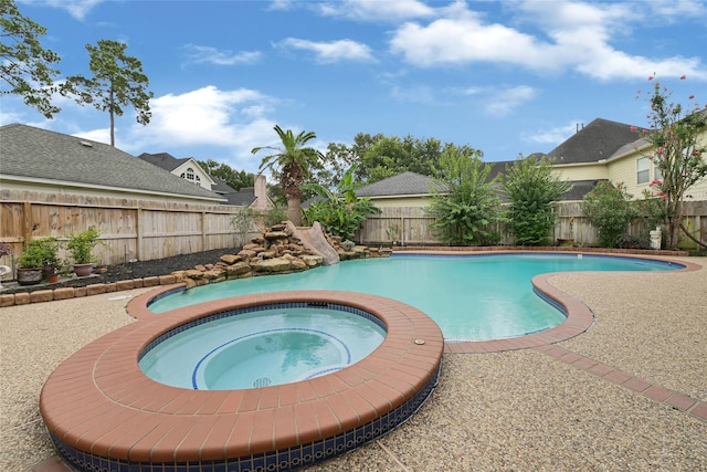 17814 Shady Arbor Way, Spring, TX 77379 - view of swimming pool featuring an in-ground hot tub and a fenced backyard