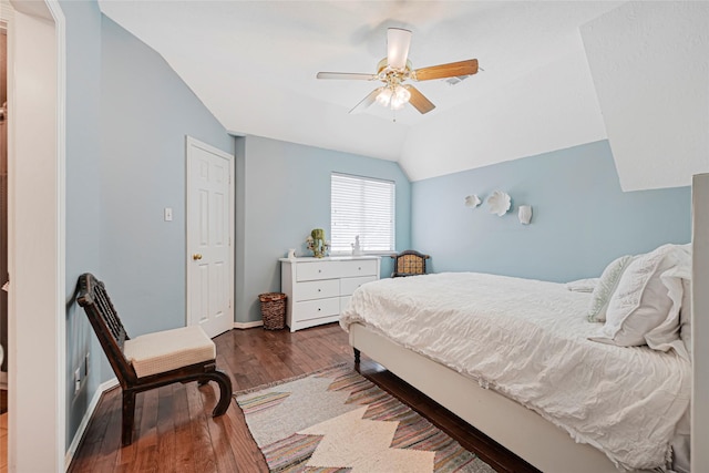 17814 Shady Arbor Way, Spring, TX 77379 - bedroom with lofted ceiling, wood finished floors, a ceiling fan, and baseboards