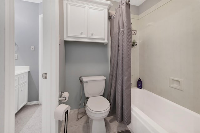17814 Shady Arbor Way, Spring, TX 77379 - bathroom with toilet, shower / bath combo with shower curtain, vanity, and baseboards