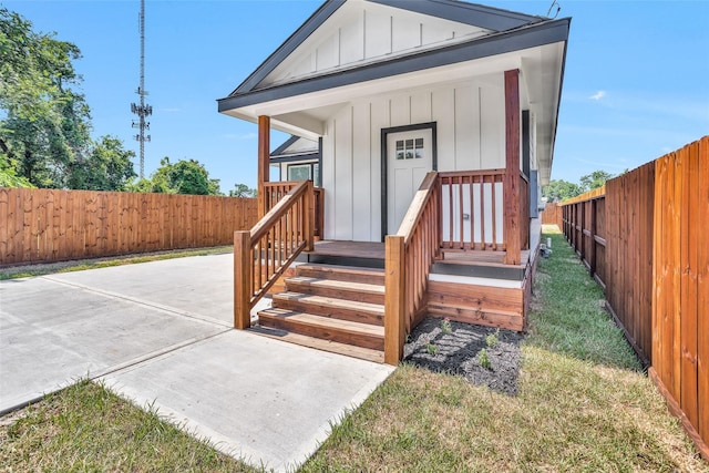 0 Basswood St, Houston, TX 77022 - view of front of property with board and batten siding and a fenced backyard