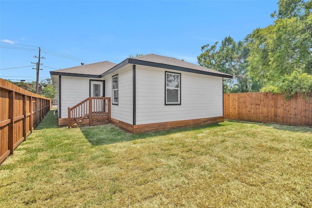0 Basswood St, Houston, TX 77022 - rear view of property featuring a shingled roof