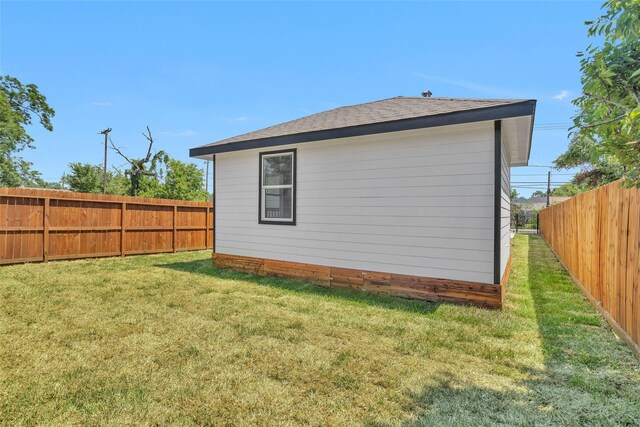 0 Basswood St, Houston, TX 77022 - rear view of house with roof with shingles