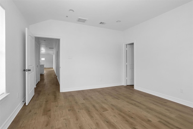 0 Basswood St, Houston, TX 77022 - spare room featuring wood finished floors and baseboards