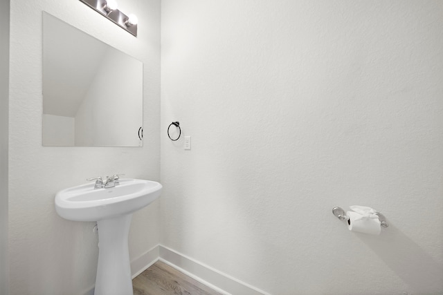 3610 Sealy St, Galveston, TX 77550 - bathroom featuring wood finished floors and baseboards