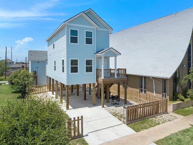 3610 Sealy St, Galveston, TX 77550 - rear view of property featuring a carport