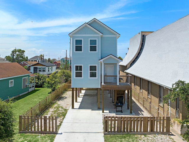 3610 Sealy St, Galveston, TX 77550 - view of front of property with a carport and concrete driveway
