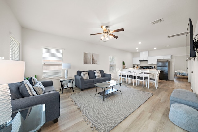 3610 Sealy St, Galveston, TX 77550 - living room with healthy amount of natural light, a ceiling fan, light wood-type flooring, and recessed lighting