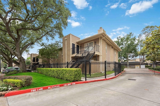 726 Bering Dr Unit F, Houston, TX 77057 - view of property featuring concrete driveway