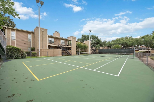 726 Bering Dr Unit F, Houston, TX 77057 - view of tennis court featuring community basketball court
