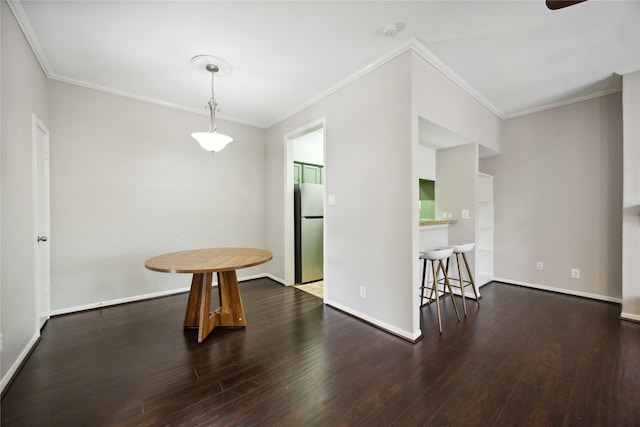 726 Bering Dr Unit F, Houston, TX 77057 - dining room featuring wood finished floors, crown molding, and a ceiling fan