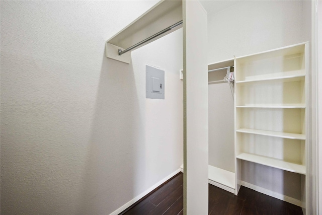 726 Bering Dr Unit F, Houston, TX 77057 - walk in closet with dark wood-style flooring