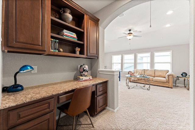 74 Spincaster Dr, Spring, TX 77389 - office area with built in desk, light colored carpet, and a ceiling fan