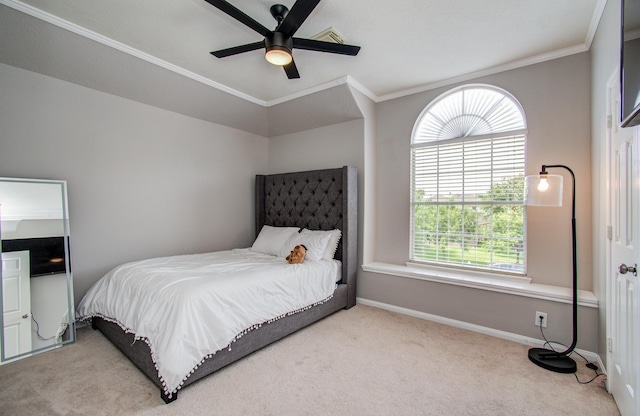 12807 Sienna Trails Dr, Tomball, TX 77377 - carpeted bedroom with crown molding, baseboards, and a ceiling fan