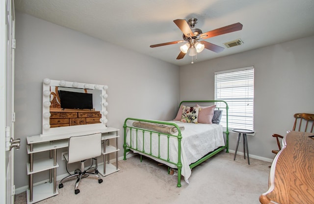 12807 Sienna Trails Dr, Tomball, TX 77377 - bedroom with baseboards, carpet flooring, an office area, and a ceiling fan