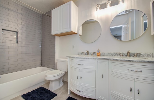 12807 Sienna Trails Dr, Tomball, TX 77377 - bathroom with double vanity, toilet, and washtub / shower combination