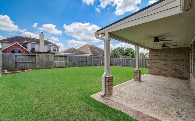 12807 Sienna Trails Dr, Tomball, TX 77377 - view of yard with a ceiling fan and a patio