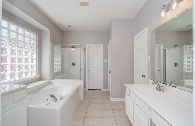 12807 Sienna Trails Dr, Tomball, TX 77377 - full bath with a shower stall, a jetted tub, vanity, and tile patterned flooring