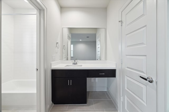 1805 Mills St, Houston, TX 77026 - bathroom with vanity, tile patterned flooring, and shower / bath combination