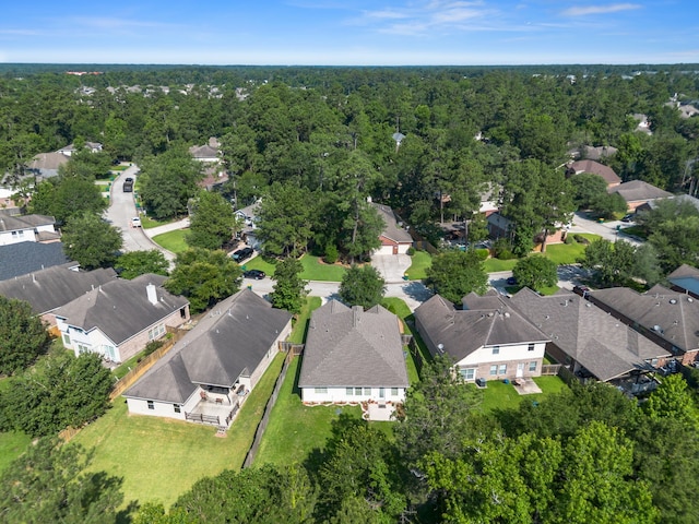 146 S Star Ridge Cir, The Woodlands, TX 77382 - aerial overview of property's location featuring nearby suburban area and a heavily wooded area