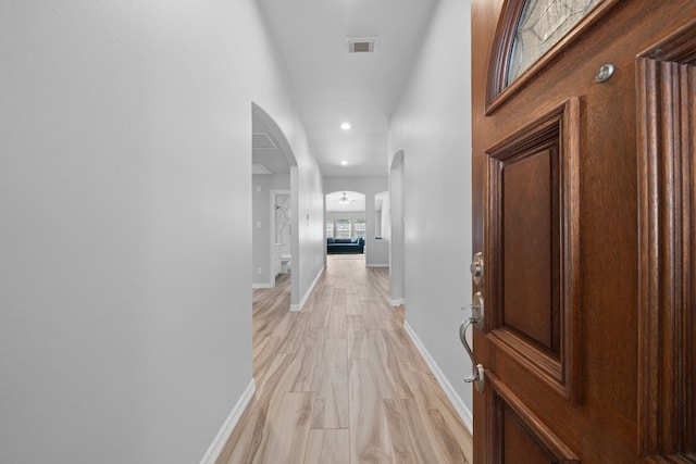 146 S Star Ridge Cir, The Woodlands, TX 77382 - corridor featuring arched walkways, baseboards, and recessed lighting