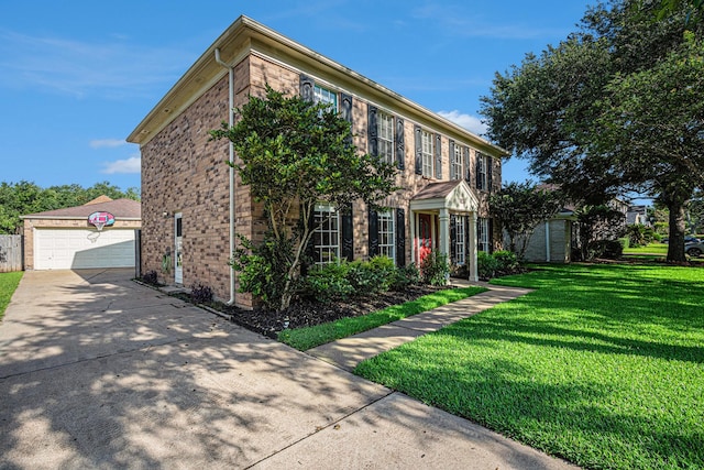 1826 Concho River Ct, Sugar Land, TX 77478 - colonial-style house featuring a front lawn, brick siding, and a garage