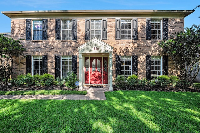 1826 Concho River Ct, Sugar Land, TX 77478 - view of front of property featuring a front yard and brick siding